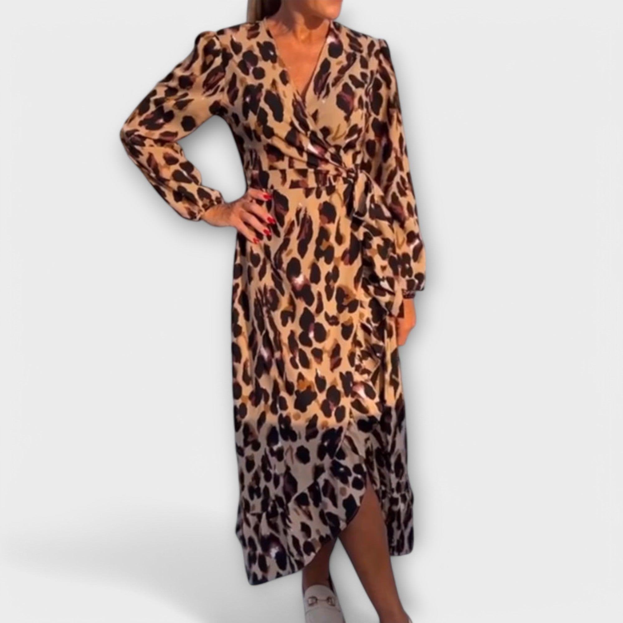 A loose leopard print dress with a V-neck